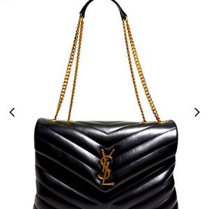 YSL quilted beautiful bag with gold chain—can be crossbody. 100% authentic.